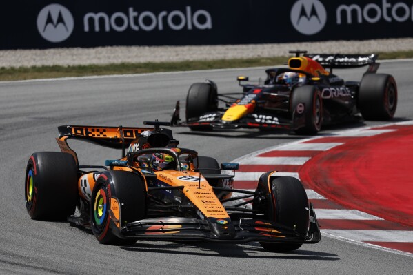 McLaren driver Oscar Piastri of Australia steers his car during the Spanish Grand Prix Formula One race at the Barcelona Catalunya racetrack in Montmelo, near Barcelona, Spain, Sunday, June 1, 2025. (AP Photo/Joan Monfort)