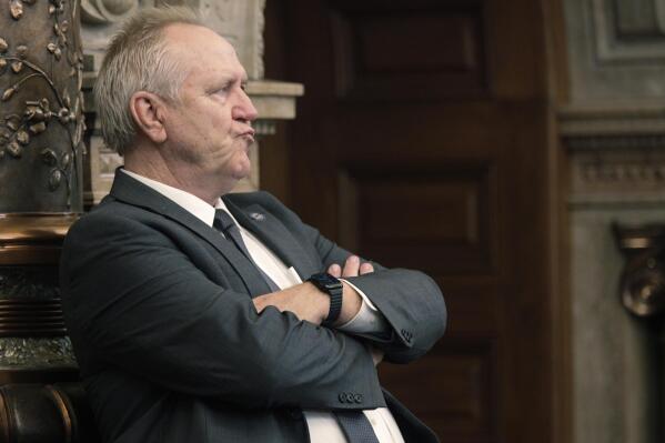 In this photo from Wednesday, March 23, 2022, Kansas state Sen. John Doll, R-Garden City, watches a debate in the Senate, at the Statehouse in Topeka, Kan. Doll considers himself a Republican in the mold of Kansas political icons Bob Dole and Dwight Eisenhower but is at odds with conservative colleagues on some key issues. (AP Photo/John Hanna)