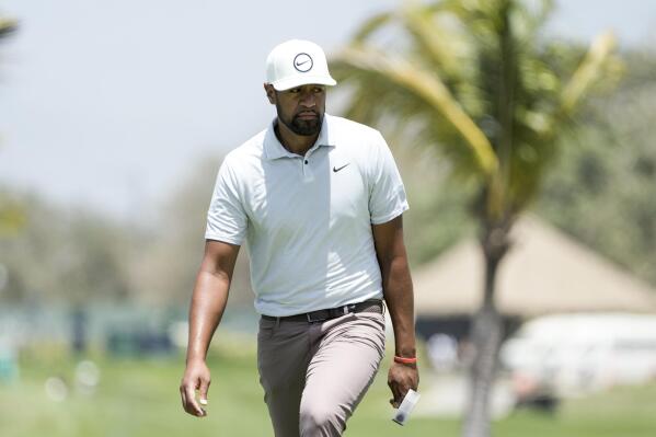 Tony Finau, of the United States, walks on the 10th green during the Mexico Open golf tournament's third round in Puerto Vallarta, Mexico, Saturday, April 29, 2023. (AP Photo/Moises Castillo)