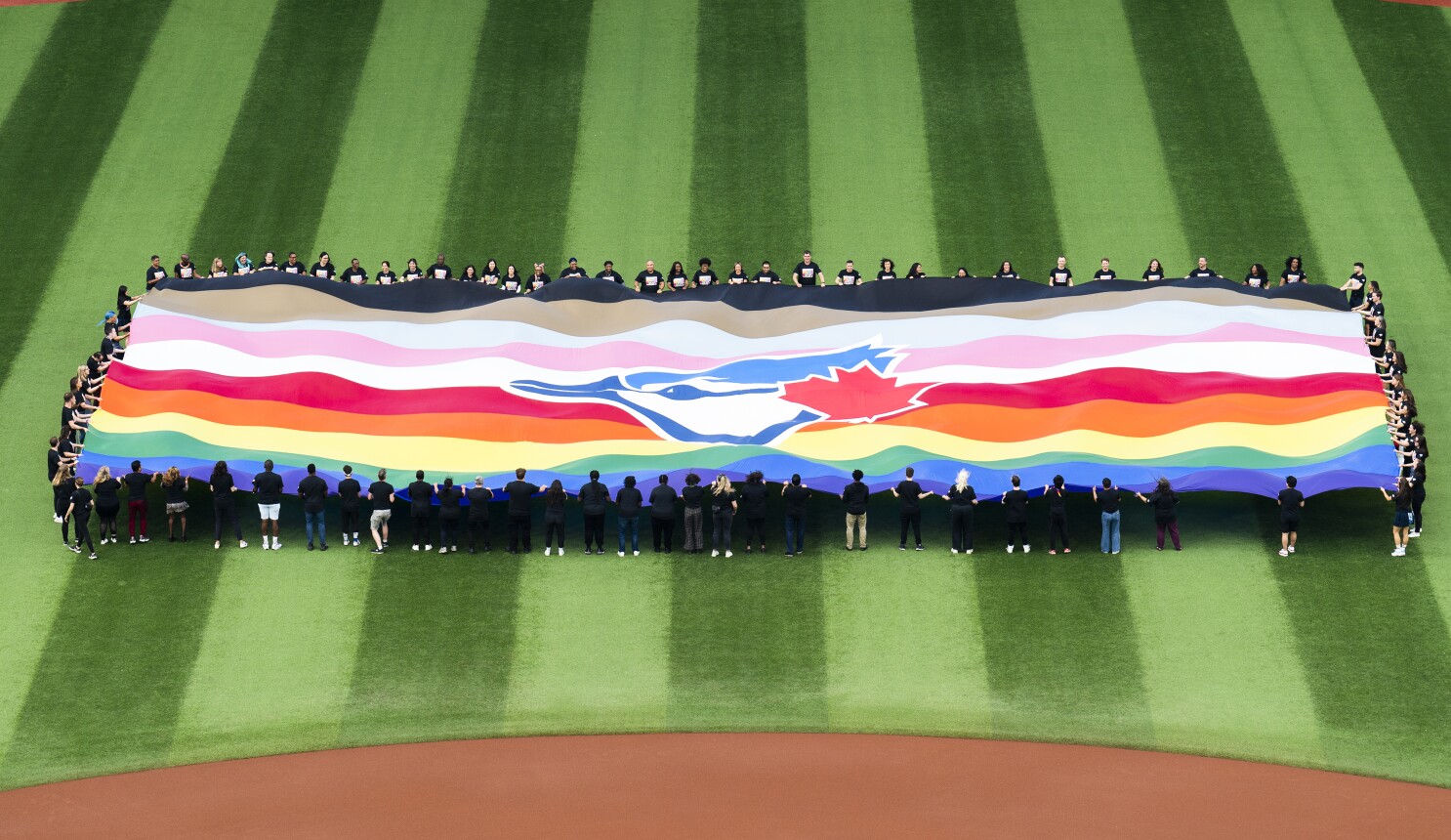 AP PHOTOS: MLB teams celebrate LGBTQ+ community with ballpark
