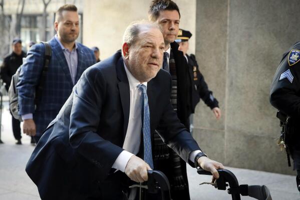 FILE - Harvey Weinstein arrives at a Manhattan courthouse as jury deliberations continue in his rape trial in New York, on Feb. 24, 2020. On Monday, Dec. 19, 2022, Weinstein was found guilty of rape at a Los Angeles trial in another #MeToo moment of reckoning, five years after he became a magnet for the movement. (AP Photo/John Minchillo, File)