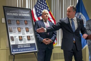 Matthew Albence, right, the acting director of U.S. Immigration and Customs Enforcement, speaks during a news conference, Friday, Jan. 17, 2020, in New York. The country's top immigration official blamed the "sanctuary policies" of New York City on Friday for the sexual assault and killing of a 92-year-old woman, while the mayor's office decried such rhetoric as "fear, hate and attempts to divide." (AP Photo/Jim Mustian)