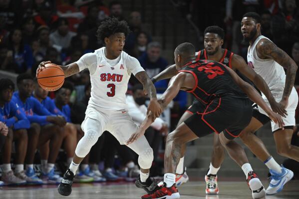 SMU guard Kendric Davis (3) controls the ball against Houston forward Fabian White Jr. (35) and guard Jamal Shead during the second half of an NCAA college basketball game Sunday, Feb. 27, 2022, in Houston. (AP Photo/Justin Rex)