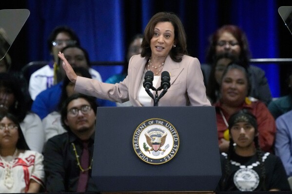 FILE - Vice President Kamala Harris speaks at the Gila River Indian Community, July 6, 2023, in Phoenix. Harris said Tuesday that the government plans to put a cap on how much families pay for child care as part of the Child Care & Development Block Grant program. (AP Photo/Rick Scuteri, File)