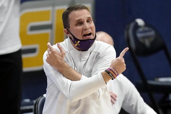 FILE - In this March 13, 2021, file photo, LSU head coach Will Wade yells to his players in the first half of an NCAA college basketball game against Arkansas in the Southeastern Conference Tournament in Nashville, Tenn. Wade dove aggressively into the college basketball transfer market to address the loss of four starters from last season including top scorer Cam Thomas. (AP Photo/Mark Humphrey, File)