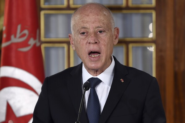 FILE - Tunisian President Kais Saied gives a speech at the new government's swearing-in ceremony at the Carthage Palace outside the capital Tunis, on Feb. 27, 2020. Tunisians will head to the polls on Sunday for the country's first local elections since President Kais Saied wrote a new constitution that voters approved last year. (Fethi Belaid/Pool via AP, File)