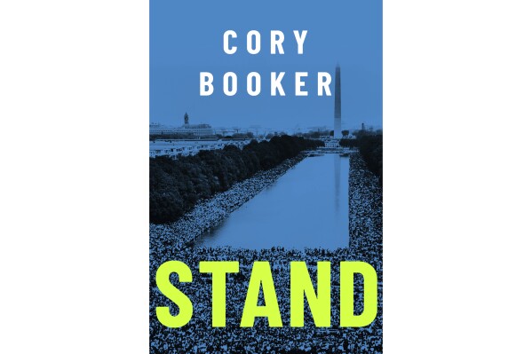 This cover image released by St. Martin's Press shows "Stand" by Cory Booker. (St. Martin's Press via AP)