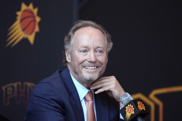New Phoenix Suns head coach Mike Budenholzer speaks during an NBA basketball news conference introducing him Friday, May 17, 2024, in Phoenix. (AP Photo/Ross D. Franklin)