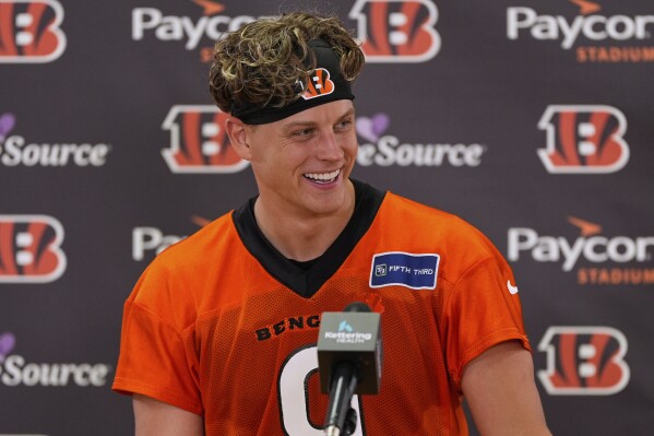 Cincinnati Bengals quarterback Joe Burrow speaks at a news conference after NFL football practice, Tuesday, May 20, 2025, in Cincinnati. (AP Photo/Carolyn Kaster)