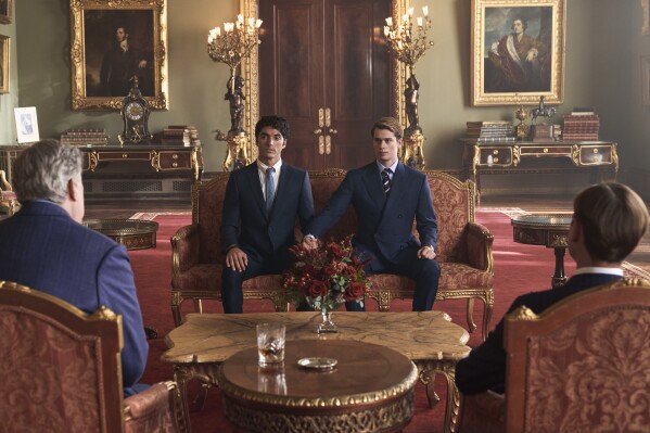 This image released by Amazon Studios shows Taylor Zakhar Perez, left, and Nicholas Galitzine in a scene from "Red, White & Royal Blue." (Jonathan Prime/Amazon Studios via AP)