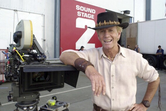 Actor Paul Hogan stands on the set of "Crocodile Dundee in Los Angeles" on the Gold Coast, Australia Tuesday Aug. 29, 2000. (AP Photo/Steve Holland, File)