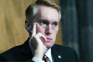 FILE - in this Sept. 24, 2020 file photo, Sen. James Lankford, R-Okla., appears on Capitol Hill in Washington. Lankford says he is quarantining after meeting with a Utah senator who tested positive for COVID-19. Lankford tweeted on Friday, Oct. 2, 2020, that he had met several times this week with fellow Republican Mike Lee, who announced earlier in the day that he had contracted the disease caused by the coronavirus. (Tom Williams/Pool via AP, File)