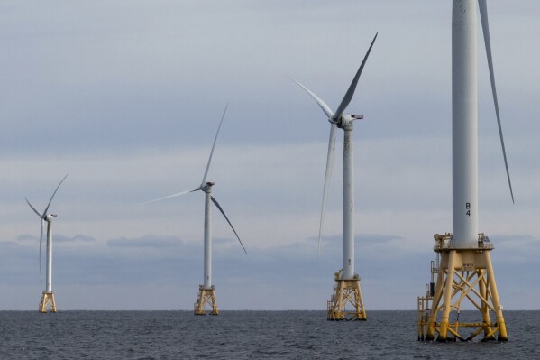 FILE - Turbines operate at the Block Island Wind Farm, Thursday, Dec. 7, 2023, off the coast of Block Island, R.I., during a tour organized by Orsted. Nations have signed on to triple renewable energy by 2030.(AP Photo/Julia Nikhinson, File)
