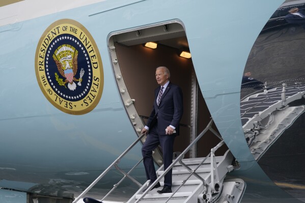 President Joe Biden arrives at Boston Logan International Airport to attend several campaign fundraisers, Tuesday, Dec. 5, 2023, in Boston. (APPhoto/Evan Vucci)