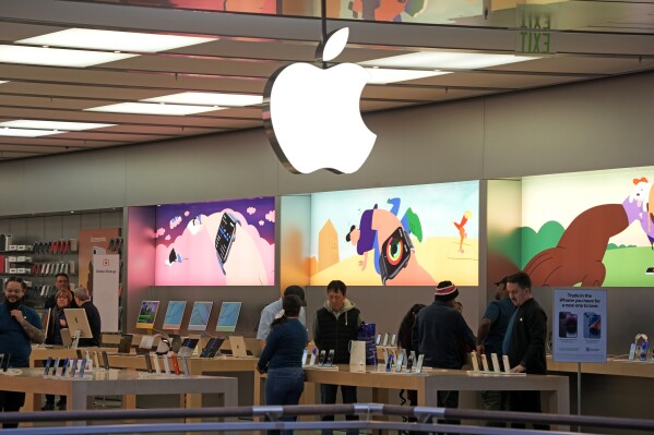 This is an Apple store in Pittsburgh on Monday, Jan. 30, 2023. Apple reports earnings on Thursday, Aug. 3. (AP Photo/Gene J. Puskar)