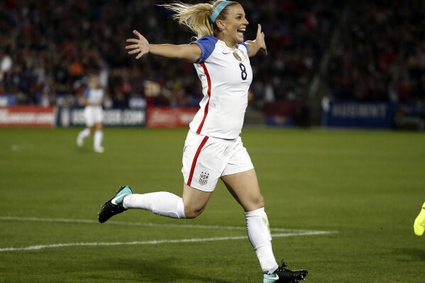 FILE - United States defender Julie Ertz (8) celebrates after scoring a goal against New Zealand during the first half of an international friendly soccer match in Commerce City, Colo., Friday, Sept. 15, 2017. Two-time U.S. Soccer Player of the Year Julie Ertz has retired from soccer after a 10-year career that included back-to-back Women's World Cup titles. I gave everything I had to the sport that I love,” she said in a statement announcing her retirement, Thursday, Aug. 31, 2023. (AP Photo/Jack Dempsey, File)