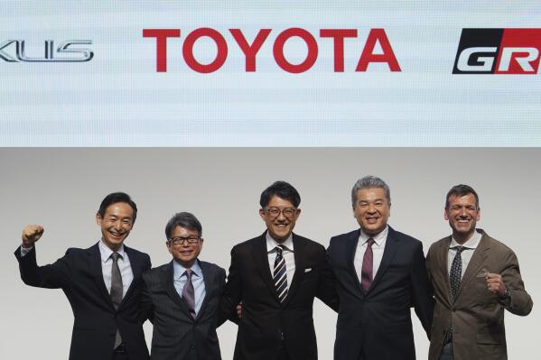 Koji Sato, center, Toyota chief branding officer and CEO-designate poses with his management teams, Kazuaki Shingo, left, chief production officer, Yoichi Miyazaki, second left, executive vice president, CFO, Hiroki Nakajima, second right, executive vice president, CTO, Simon Humphries, right, chief branding officer, during a press conference Monday, Feb. 13, 2023, in Tokyo. Sato, who was appointed the next president at Japan’s top automaker Toyota, introduced a management team Monday that he said will lead an aggressive push on electric vehicles. (AP Photo/Eugene Hoshiko)