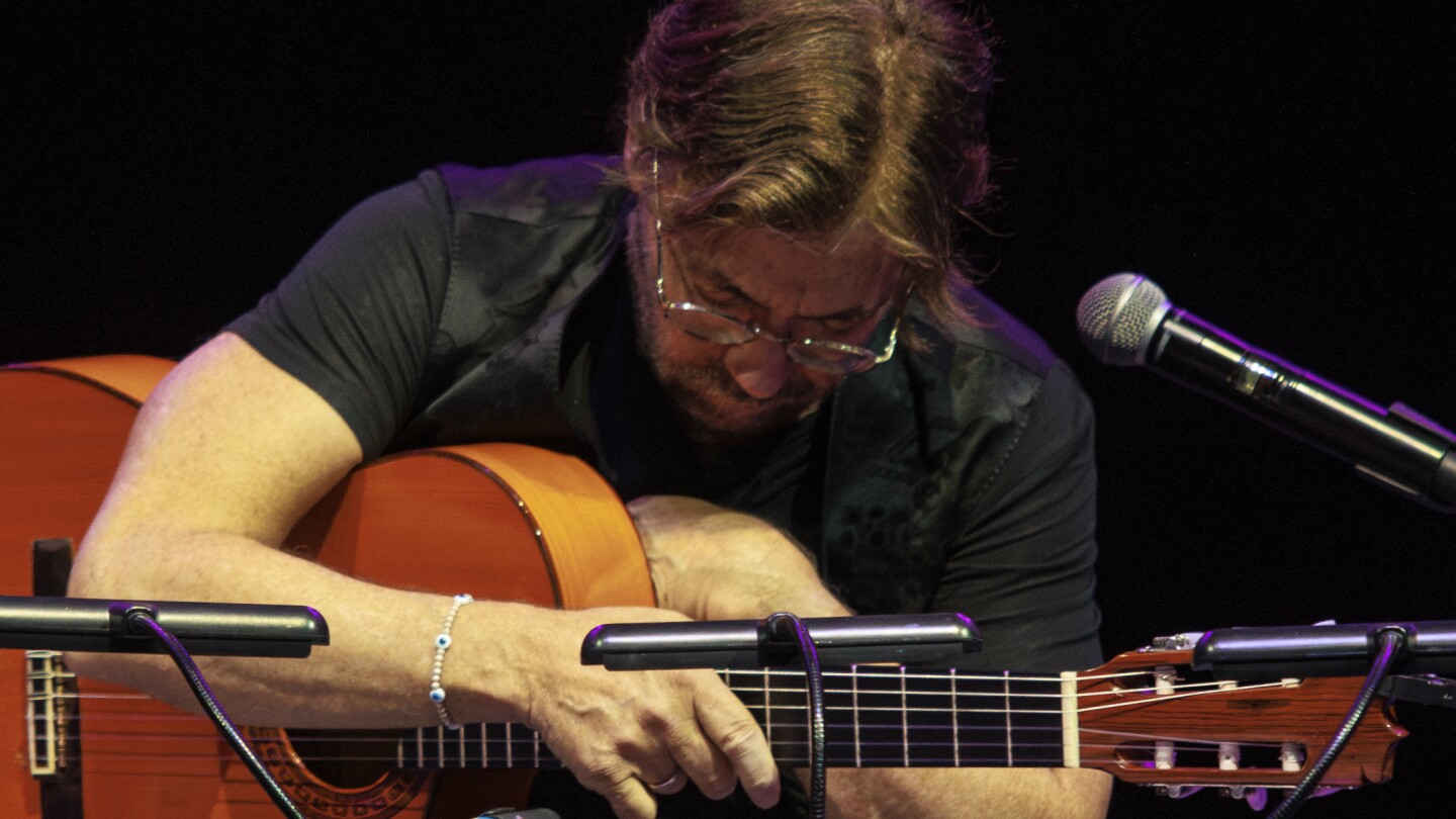 US guitarist Al Di Meola suffers a heart attack on stage in Romania but is now in a stable condition
