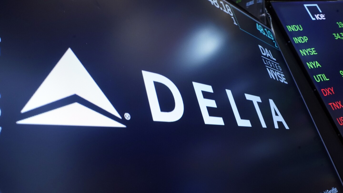 Delta posts a 2 billion quarterly profit, but shares dip as airline