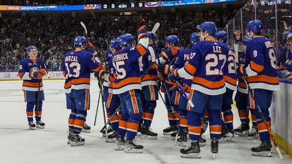 New York Islanders left wing Zach Parise (11) celebrates his goal