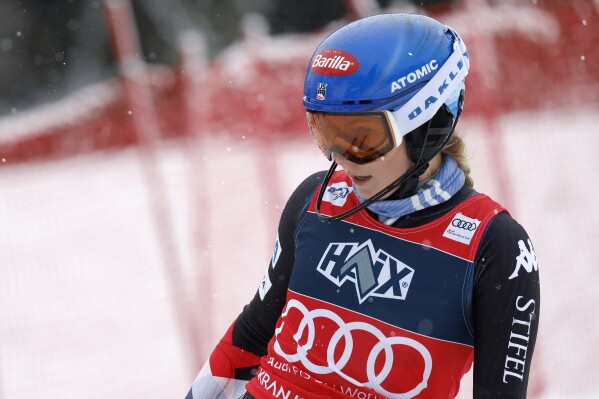 United States' Mikaela Shiffrin skis down the course after straddling a pole during the first run of an alpine ski, women's World Cup slalom race, in Kranjska Gora, Slovenia, Sunday, Jan. 7, 2024. (AP Photo/Giovanni Maria Pizzato)