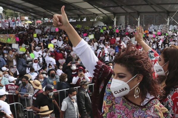 FILE - Clara Brugada, borough president candidate, greets Morena supporters on the last day of campaigning ahead of the June 6 mid-term elections, in the Iztapalapa borough of Mexico City, June 2, 2021. Morena, the country’s ruling party, nominated Brugada as their mayoral candidate for Mexico City, on Saturday, Nov. 11, 2023. (AP Photo/Marco Ugarte, File)