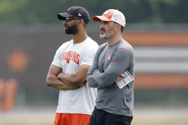 FILE - Cleveland Browns head coach Kevin Stefanski, right, stands with general manager Andrew Berry during drills at the NFL football team's practice facility Tuesday, June 6, 2023, in Berea, Ohio. The Browns have rewarded Stefanski and Berry with contract extensions after they brought success and stability to an organization that had little before their arrival. (AP Photo/Ron Schwane, FIle)