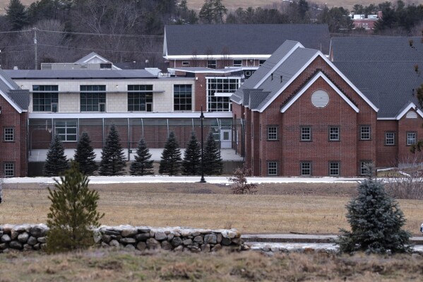 FILE - The Sununu Youth Services Center in Manchester, N.H., stands among trees, Jan. 28, 2020. The facility's former superintendent spoke to The Associated Press on Tuesday, May 21, 2024, defending his tenure several weeks after a jury found the state negligent and awarded $38 million to a former resident. (AP Photo/Charles Krupa, File)