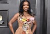 FILE - SZA arrives at the 64th Annual Grammy Awards in Las Vegas on April 3, 2022. SZA received nine Grammy nominations on Friday. (Photo by Jordan Strauss/Invision/AP, File)