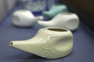 FILE - Neti pots are seen, Jan. 30, 2008, in Lexington, Ky. The Centers for Disease Control and Prevention on Wednesday, March 13, 2024, published a report that for the first time connects Acanthamoeba infections to use of Neti pots and other nasal rinsing devices. (Mark Cornelison/Lexington Herald-Leader via AP, File)