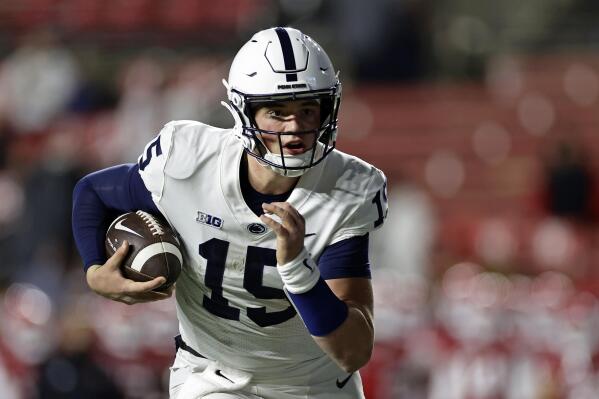 Penn State quarterback Drew Allar rushes against Rutgers during the second half of an NCAA college football game Saturday, Nov. 19, 2022, in Piscataway, N.J. Penn State won 55-10. (AP Photo/Adam Hunger)
