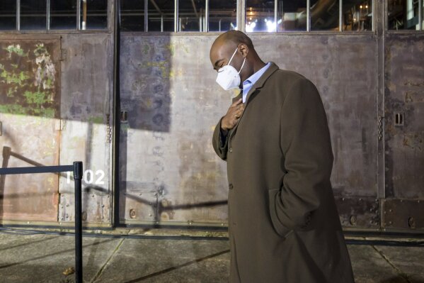 U.S. Senate candidate Jaime Harrison waits to take the stage at an election watch party Hunter-Gatherer at Curtiss Wright Hangar in Columbia, S.C., Tuesday, Nov. 3, 2020, after conceding the election to incumbent Lindsey Graham. (Jeff Blake/The State via AP)