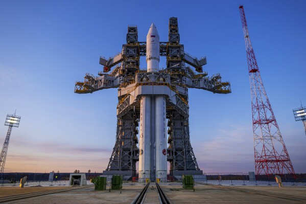 In this photo released by Roscosmos space corporation on Wednesday, April 3, 2024 an Angara-A5 rocket is seen during preparation for the launch at Vostochny space launch facility outside the city of Tsiolkovsky, about 200 kilometers (125 miles) from the city of Blagoveshchensk in the far eastern Amur region, Russia. The Angara-A5 is a new heavy-lift rocket developed in Russia. (Roscosmos space corporation via AP)