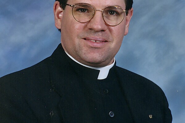 This image provided by the Archdiocese of Omaha shows the Rev. Stephen Gutgsell. (Archdiocese of Omaha via AP)
