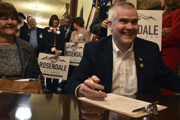 FILE - Montana Republican Rep. Matt Rosendale files paperwork to run for U.S. Senate, Friday, Feb. 9, 2024, at the state Capitol in Helena, Mont. Rosendale announced Thursday, Feb. 15, that he was ending his campaign after former President Donald Trump endorsed his Republican opponent, former Navy SEAL Tim Sheehy. (AP Photo/Matthew Brown, File)