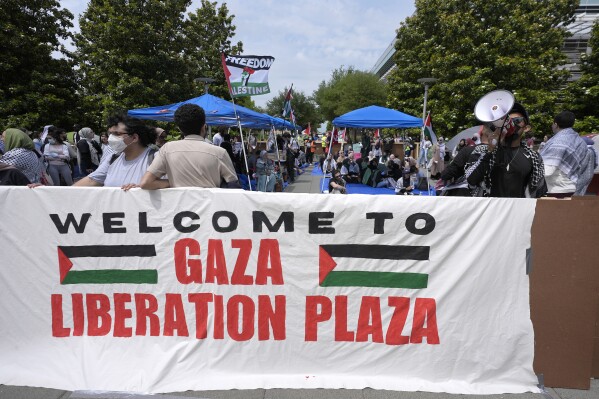 FILE - People gather to protest against the Israel-Hamas war at a plaza at the University of Texas at Dallas, Wednesday, May 1, 2024, in Richardson, Texas. (AP Photo/LM Otero, File)