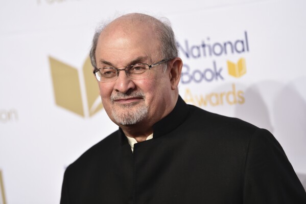 FILE - Salman Rushdie attends the 68th National Book Awards Ceremony and Benefit Dinner on Nov. 15, 2017, in New York. Rushdie, Cheryl Strayed, Carl Hiassen and Ibram X. Kendi are among hundreds of authors who have endorsed an announcement by the American Library Association and the Association of American Publishers that calls attention to the 70th anniversary of a Freedom to Read Statement issued by book publishers and librarians during the height of the McCarthy era. (Photo by Evan Agostini/Invision/AP, File)