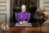 Koningin Margrethe II houdt haar nieuwjaarstoespraak en kondigt haar troonsafstand aan van het paleis van Christian IX, kasteel Amalienborg, in Kopenhagen, zondag 31 december 2023. (Keld Navntoft/Ritzau Scanpix via AP)
