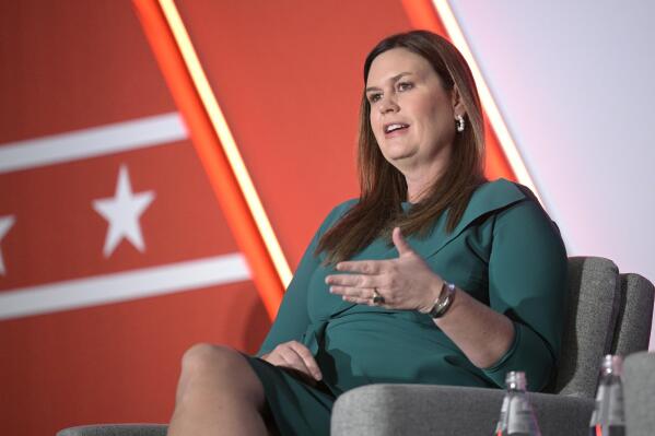 FILE - Arkansas Governor-elect Sarah Huckabee Sanders answers a question while taking part in a panel discussion during a Republican Governors Association conference on Nov. 16, 2022, in Orlando, Fla. Sanders will deliver the Republican address to the nation in response to President Joe Biden's State of the Union speech as the GOP seeks to show it's creating a new generation of leadership. (AP Photo/Phelan M. Ebenhack, File)