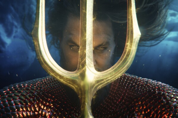This image released by Warner Bros. Pictures shows Jason Momoa in a scene from "Aquaman and the Lost Kingdom." (Warner Bros. Pictures via AP)