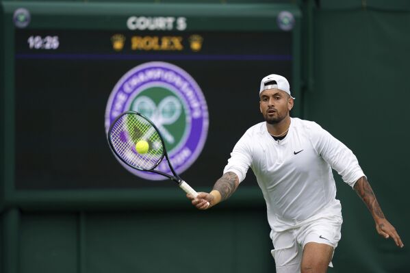 Australia's Nick Kyrgios practices at the All England Lawn Tennis and Croquet Club in Wimbledon, England, Saturday July 1, 2023, ahead of the Wimbledon tennis championships which start on Monday. (John Walton/PA via AP)