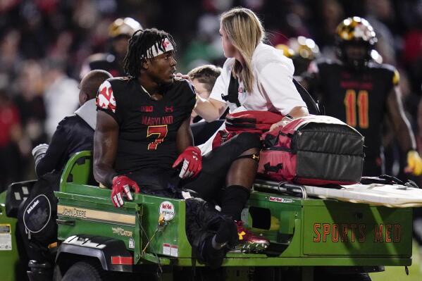 Maryland wide receiver Dontay Demus Jr. is carted off the field during the first half of an NCAA college football game against Iowa, Friday, Oct. 1, 2021, in College Park, Md. (AP Photo/Julio Cortez)