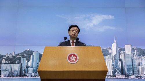 FILE - Hong Kong Chief Executive John Lee speaks during a press conference in Hong Kong, March 21, 2023. Lee said on Tuesday, July 4 that eight pro-democracy activists who now live in the U.S. The United States, Britain, Canada and Australia will be prosecuted for life for alleged national security offences, dismissing criticism that the decision to arrest them set a dangerous precedent.  (AP Photo/Louise Delmotte, file)