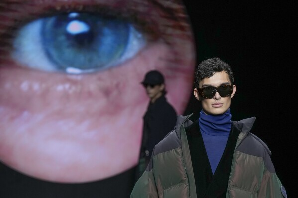 A model wears a creation part of the men's Giorgio Armani Fall-Winter 2024-2025 collection, that was presented in Milan, Italy, Sunday, Jan. 14, 2024. (AP Photo/Antonio Calanni).