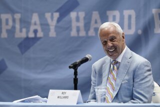 North Carolina Head Basketball Coach Roy Williams speaks with members of the media during a news conference, Thursday, April 1, 2021, in Chapel Hill, N.C. Williams is retiring after 33 seasons and 903 wins as a college basketball head coach. The Hall of Fame coach led the University of North Carolina to three NCAA championships in 18 seasons as head coach of the Tar Heels. (AP Photo/Gerry Broome)