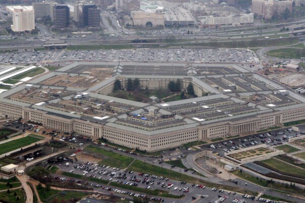  FILE - The Pentagon is seen in this aerial view, March 27, 2008,   in Washington. President Joe Biden announced Wednesday that troops who were convicted under a military policy criminalizing consensual gay sex would receive full pardons — a move that could restore their discharges from military service to an honorable status and pave the way for benefits. Potentially thousands of veterans are affected,  but many questions remain about the policy that the Pentagon and Department of Veterans Affairs must work through. (AP Photo/Charles Dharapak, File)