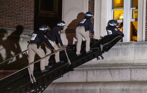 Using a tactical vehicle, New York City police enter an upper floor of Hamilton Hall on the Columbia University campus in New York, Tuesday, April 30, 2024, after the building was taken over by protesters earlier in the day. (AP Photo/Craig Ruttle, File)