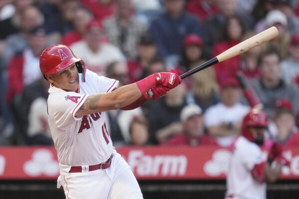 FILE - Los Angeles Angels' Gio Urshela (10) swings during a baseball game against the Toronto Blue Jays in Anaheim, Calif., Saturday, April 8, 2023. Third baseman Gio Urshela and the Detroit Tigers agreed Thursday, Feb. 22, 2024, to a $1.5 million, one-year contract. Urshela hit .299 with two homers and 24 RBIs in 62 games last season for the Los Angeles Angels.(AP Photo/Ashley Landis, File)