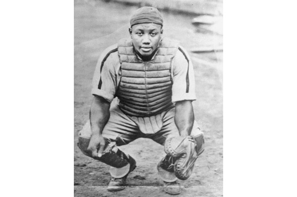 FILE - Baseball catcher Josh Gibson in an undated photo. Josh Gibson became Major League Baseball's career leader with a .372 batting average, surpassing Ty Cobb's .367, when records of the Negro Leagues for more than 2,300 players were incorporated after a three-year research project. (AP Photo/File)