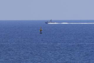 FILE - An Israeli Navy vessel patrols in the Mediterranean Sea, while Lebanon and Israel are being called to resume indirect talks over their disputed maritime border with U.S. mediation, off the southern town of Naqoura, Monday, June 6, 2022. The Israeli military on Saturday, July 2, 2022 said it shot down three unmanned aircraft launched by the Lebanese militant group Hezbollah heading toward an area where an Israeli gas platform was recently installed in the Mediterranean Sea. (AP Photo/Mohammed Zaatari, File)